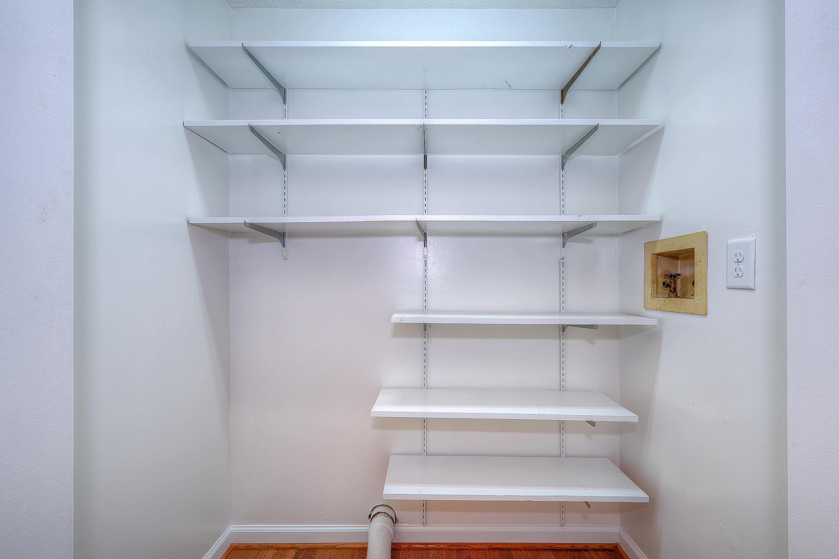 2509 Rutrough Road Southeast Roanoke, VA 24014 - Photo 13 of 28 a view of a room with shelf on the wall