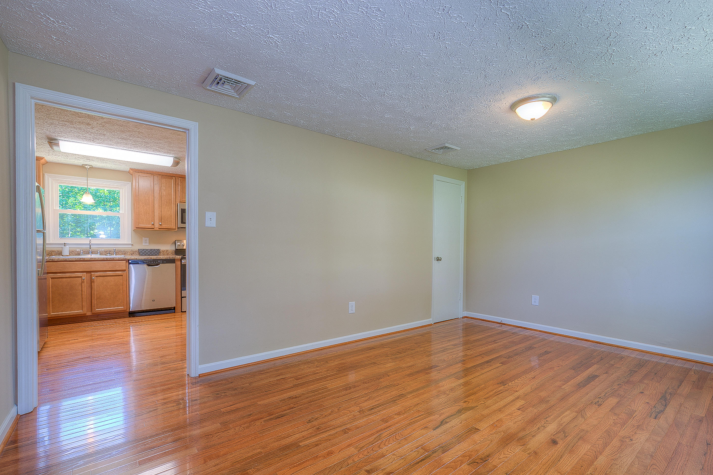 2509 Rutrough Road Southeast Roanoke, VA 24014 - Photo 16 of 28 a view of a room with wooden floor and a sink