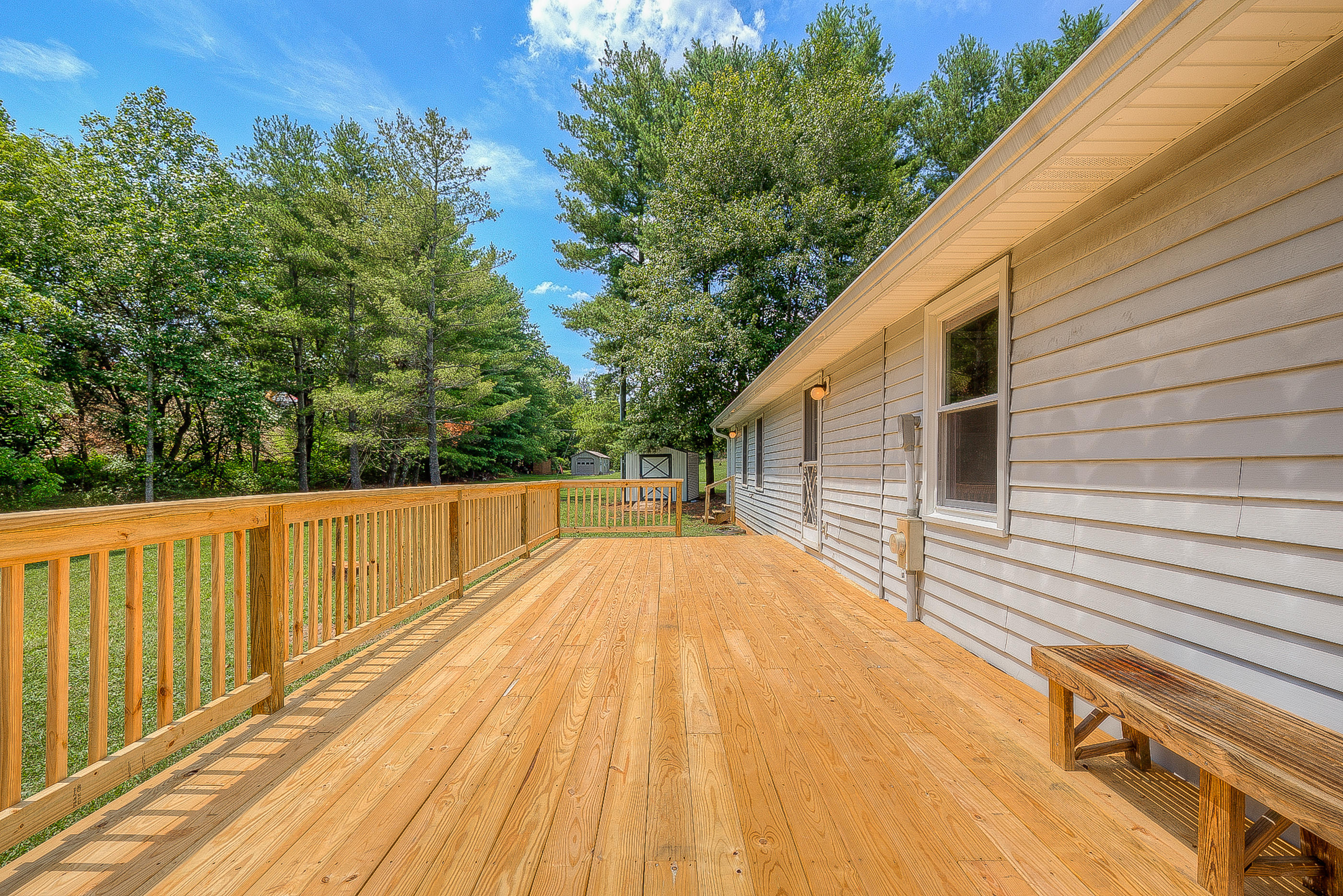 2509 Rutrough Road Southeast Roanoke, VA 24014 - Photo 25 of 28 a view of balcony with wooden floor and fence