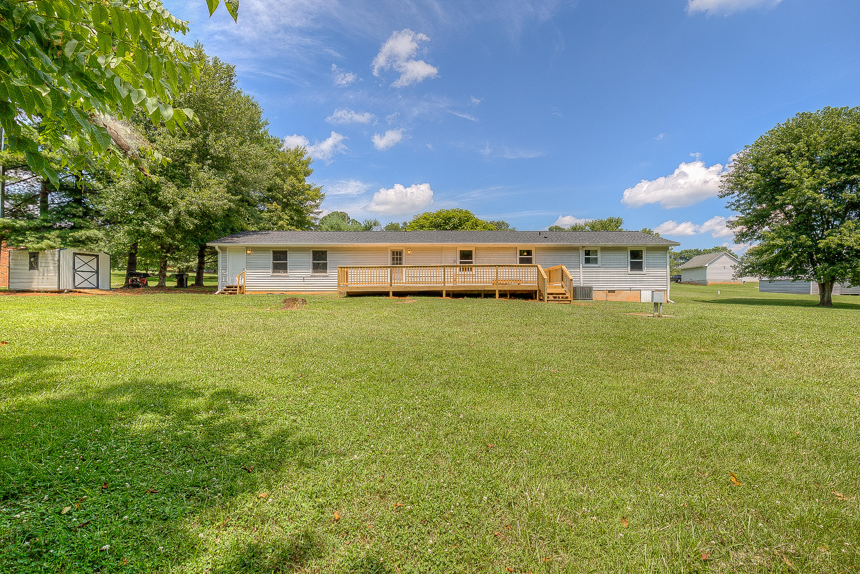 2509 Rutrough Road Southeast Roanoke, VA 24014 - Photo 28 of 28 a view of a house with a big yard