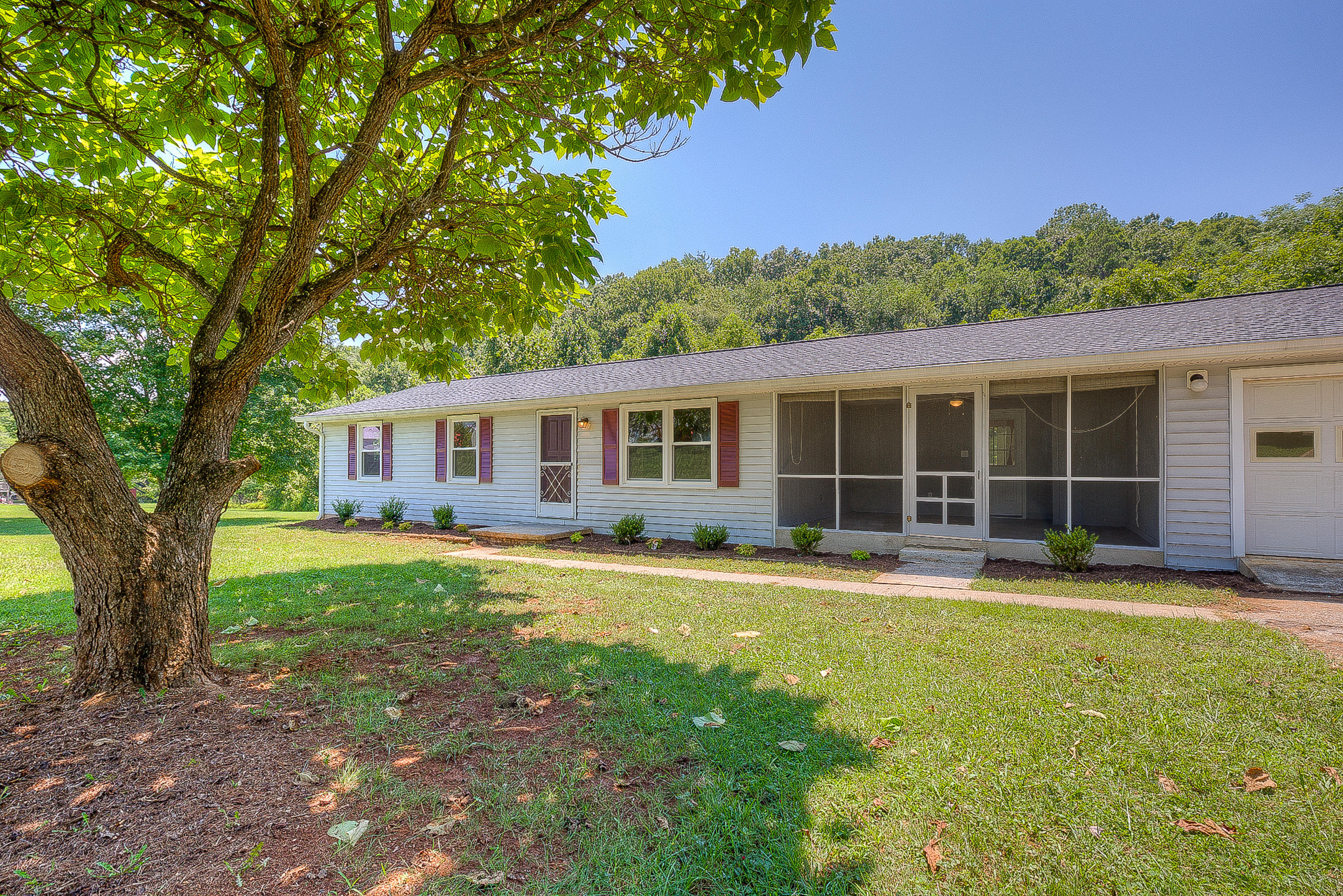 2509 Rutrough Road Southeast Roanoke, VA 24014 - Photo 5 of 28 front view of a house with a yard