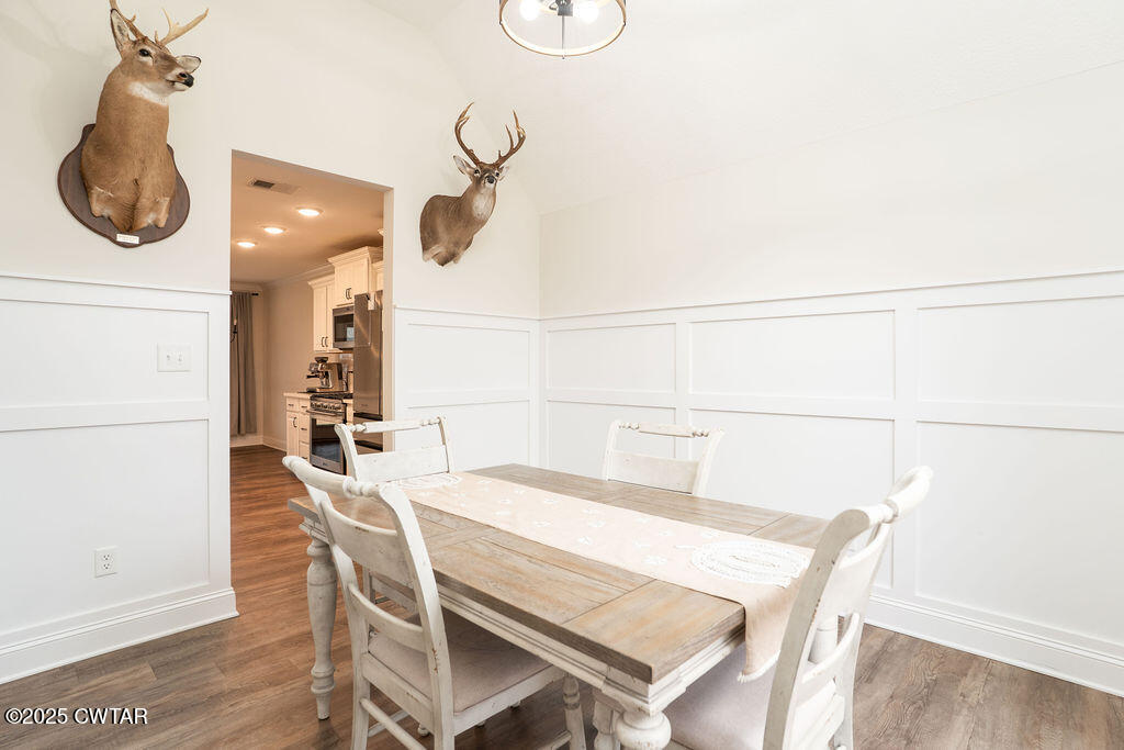 104 Springview Cove Medina, TN 38355 - Photo 11 of 37 a dining room with a table and chairs