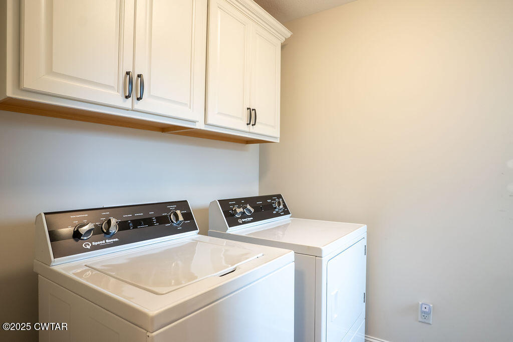 104 Springview Cove Medina, TN 38355 - Photo 19 of 37 a utility room with dryer and washer