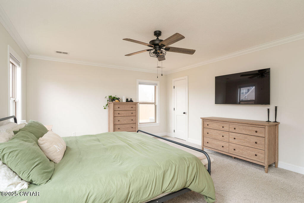 104 Springview Cove Medina, TN 38355 - Photo 30 of 37 a bedroom with a bed and a dresser