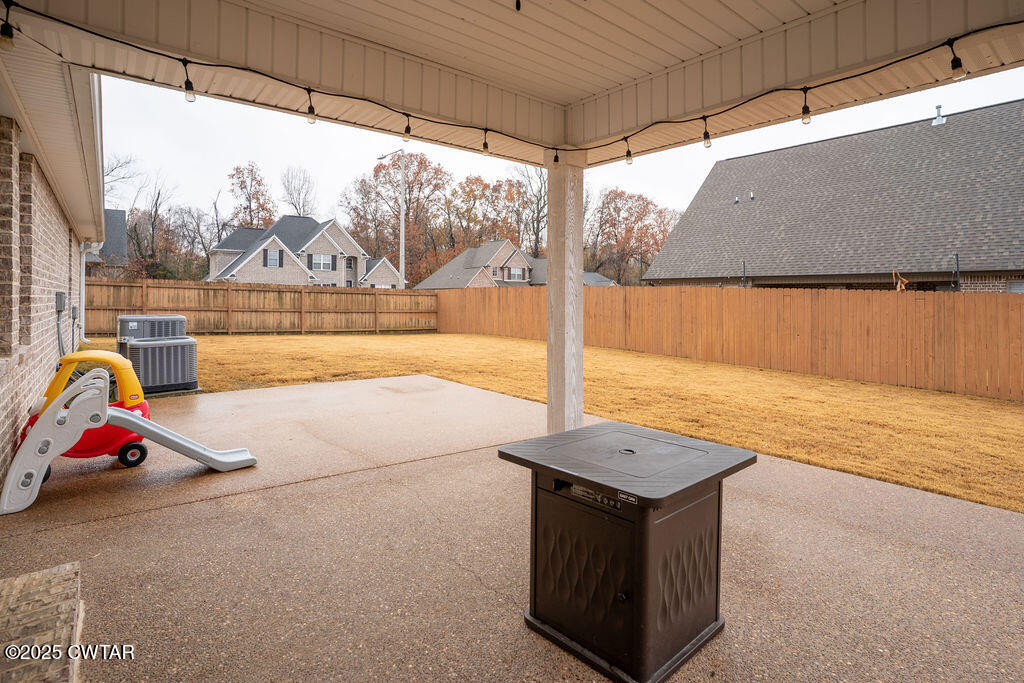 104 Springview Cove Medina, TN 38355 - Photo 34 of 37 a living room with a couch and a table