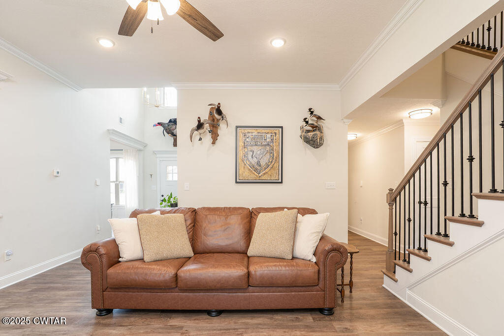 104 Springview Cove Medina, TN 38355 - Photo 6 of 37 a living room with furniture and a ceiling fan
