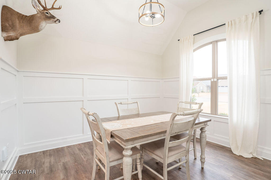 104 Springview Cove Medina, TN 38355 - Photo 7 of 37 a view of a dining room with furniture window and wooden floor