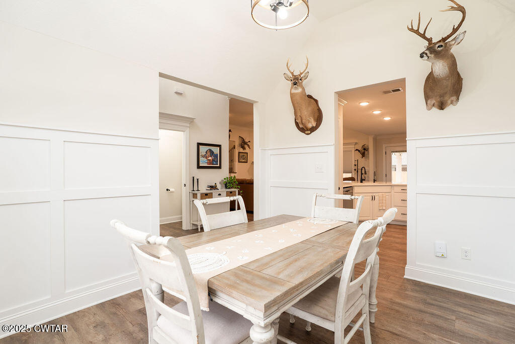 104 Springview Cove Medina, TN 38355 - Photo 9 of 37 a dining room with furniture and a mirror