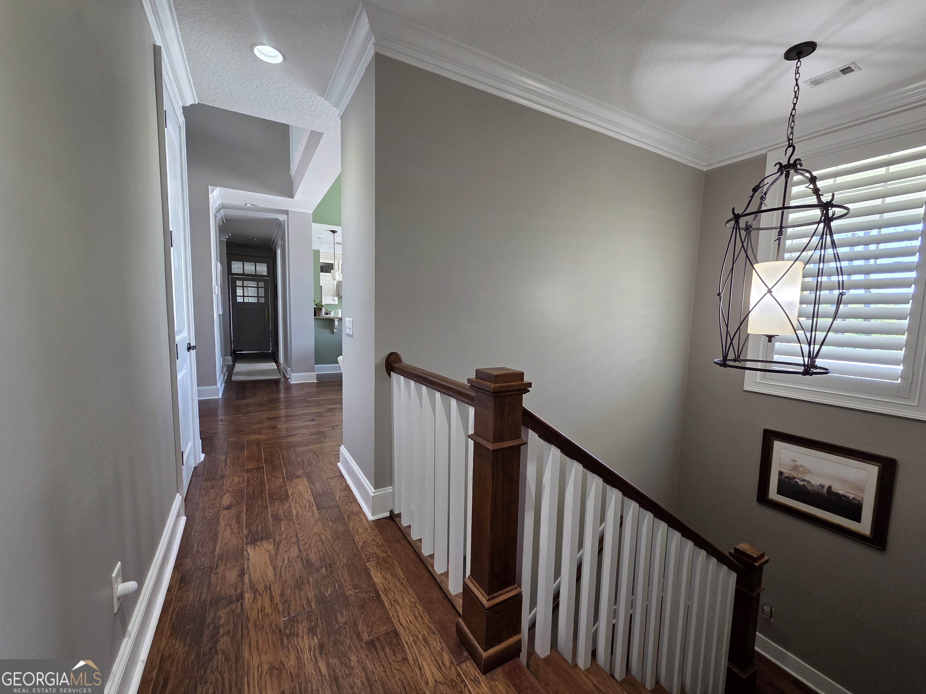 300 Hammond Powell Road Hazlehurst, GA 31539 - Photo 67 of 91 a view of a hallway with wooden floor and stairs