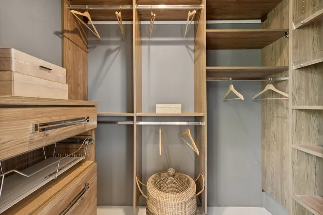 a bedroom with a bed and a view of bathroom