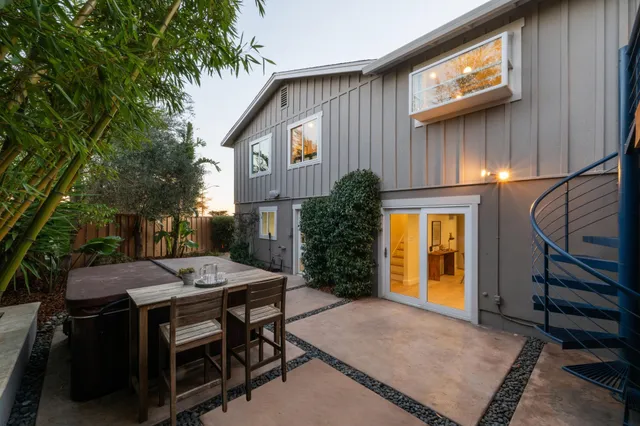 a view of a livingroom with furniture and a window