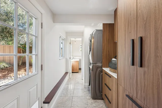 a front view of a house with outdoor seating