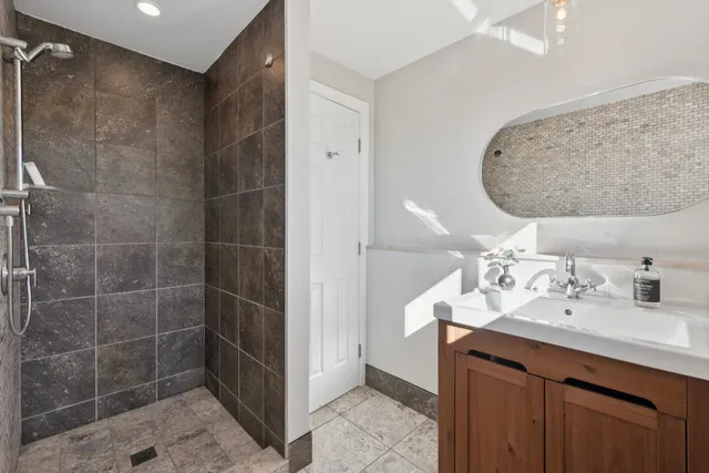 a view of city with ocean