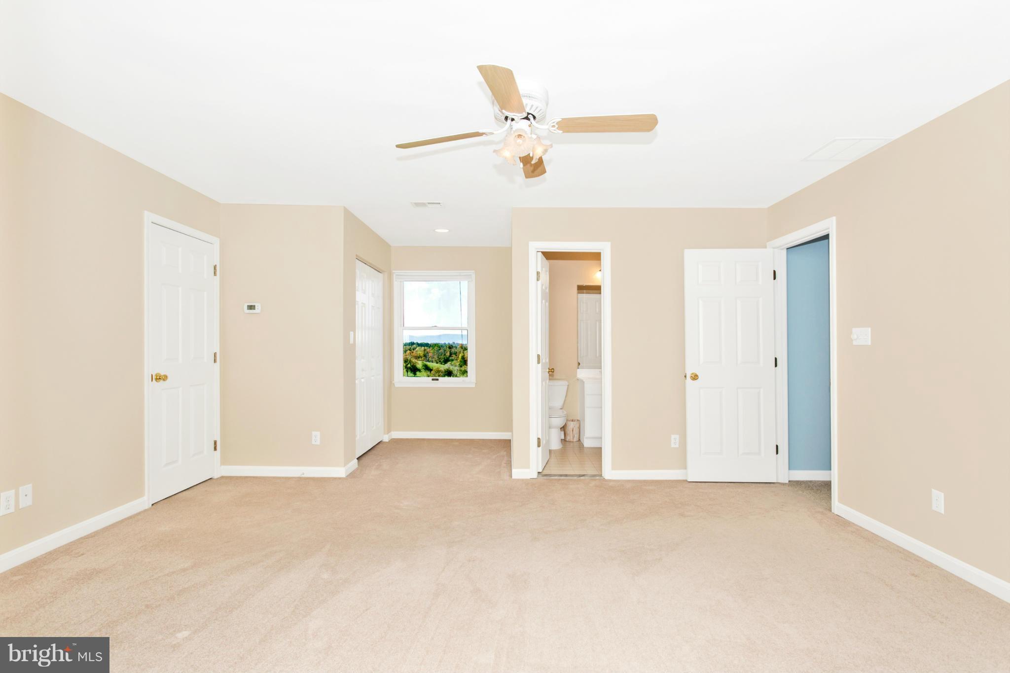 11841 Renner Road Keymar, MD 21757 - Photo 29 of 30 a view of a livingroom with a ceiling fan and window