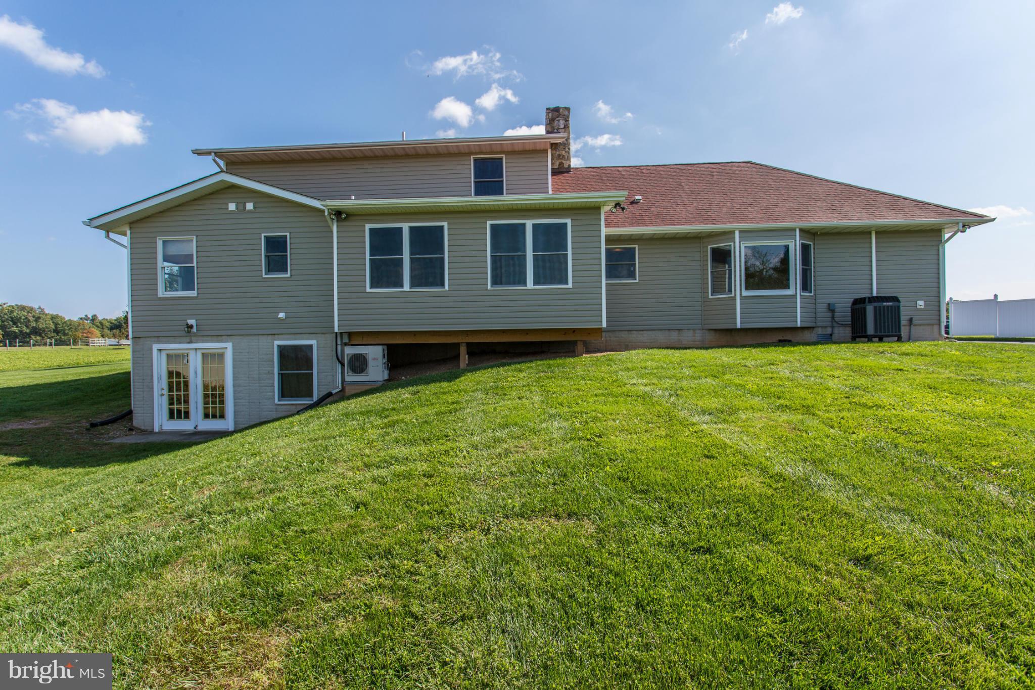 11841 Renner Road Keymar, MD 21757 - Photo 8 of 30 a front view of a house with a yard