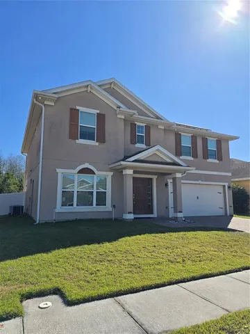 a view of a house with a swimming pool