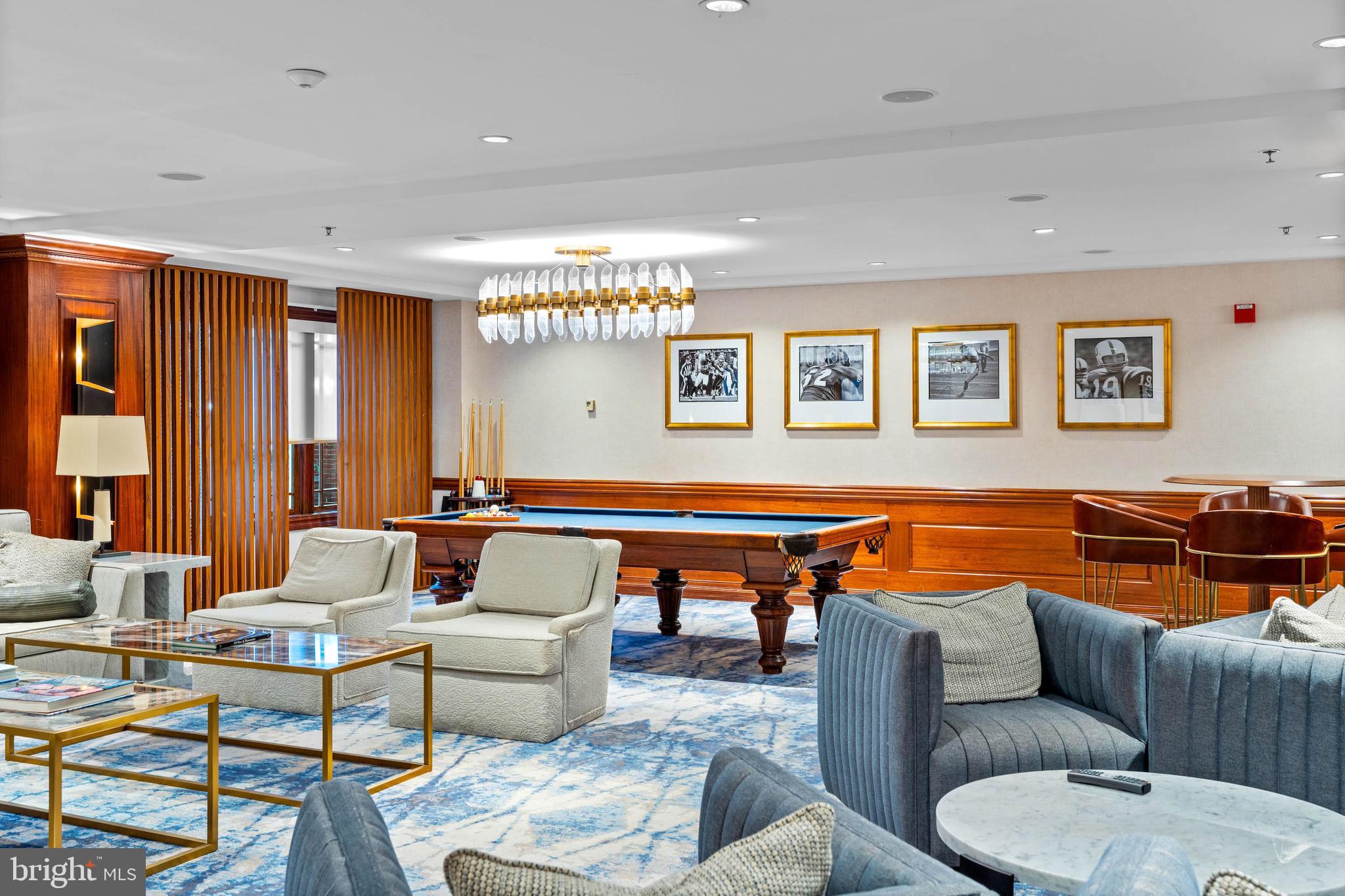 801 Key Highway, Unit 436 Baltimore, MD 21230 - Photo 21 of 27 a reading room with furniture pool table and a large window