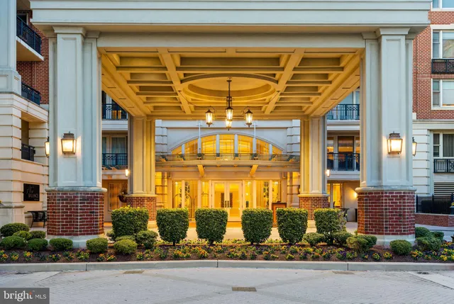 a view of swimming pool with outdoor seating