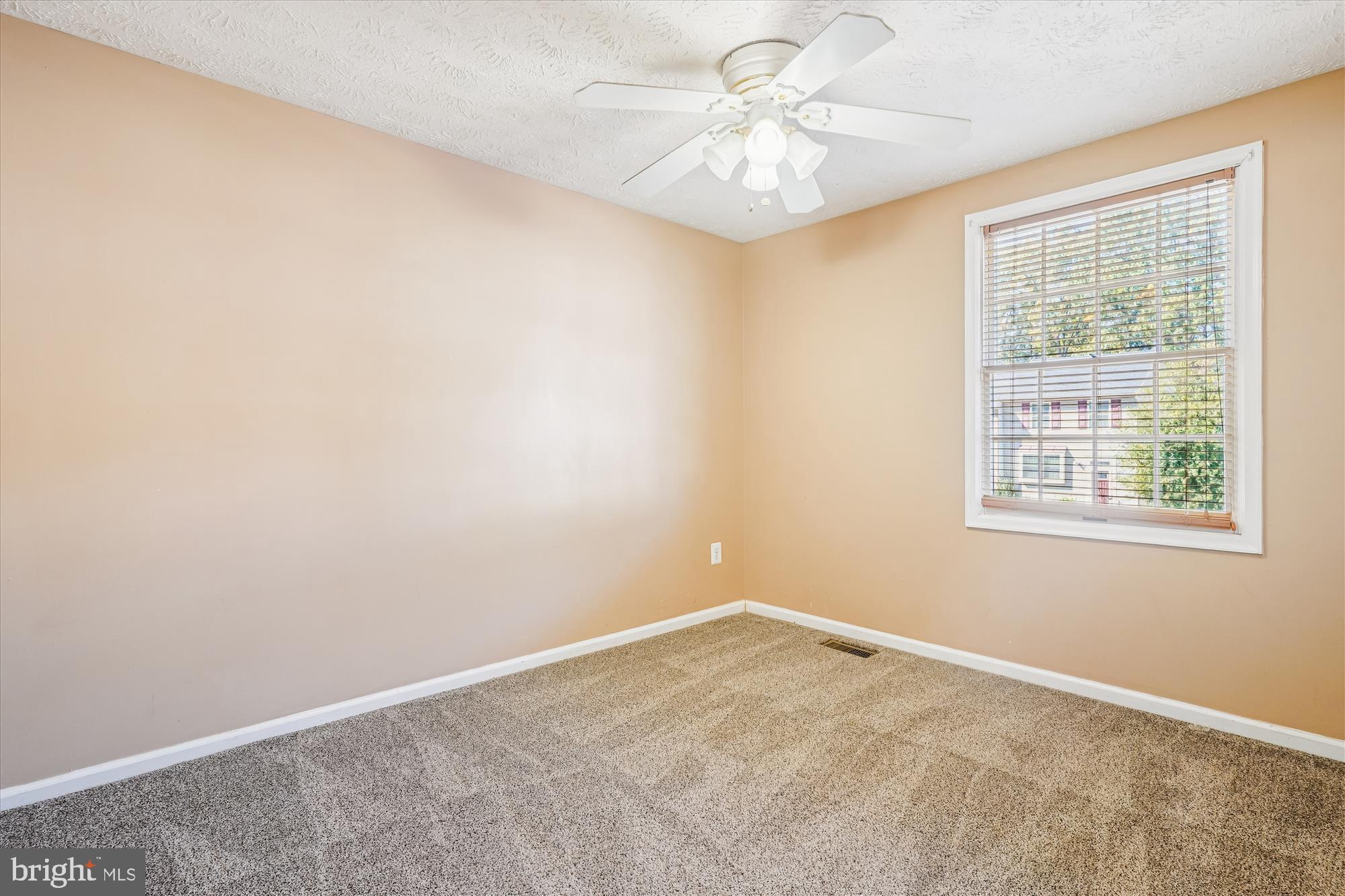 14740 Winding Loop Woodbridge, VA 22191 - Photo 24 of 59 an empty room with a window