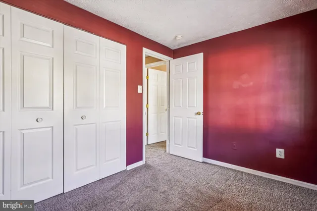 an empty room with a bathroom