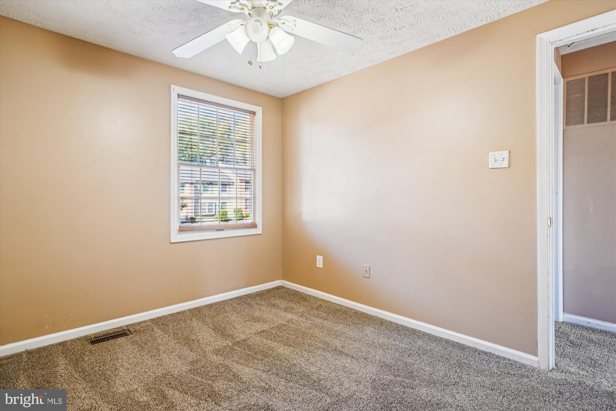 14740 Winding Loop Woodbridge, VA 22191 - Photo 27 of 59 an empty room with a window