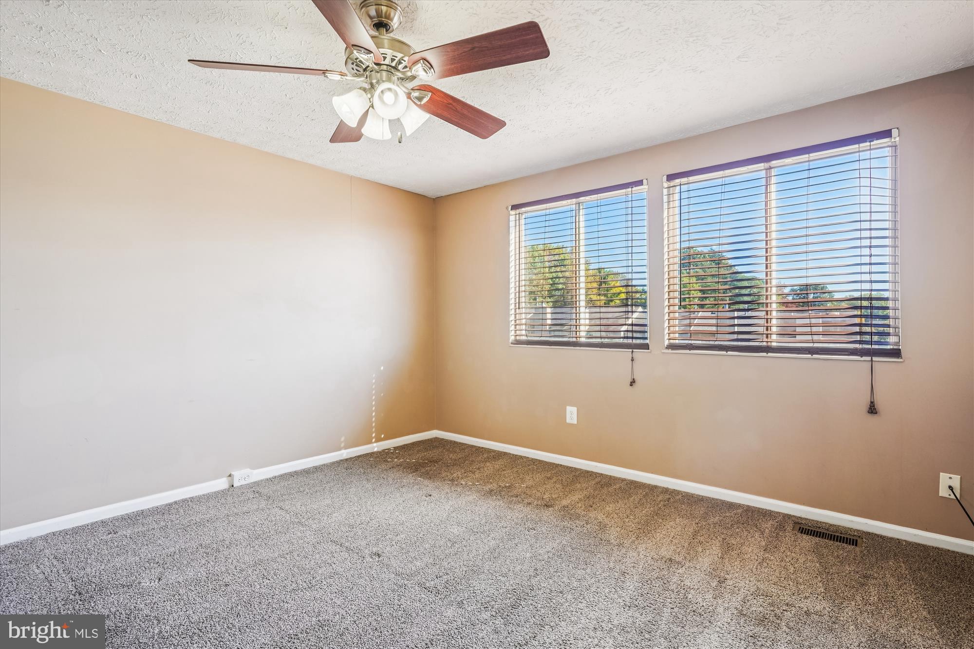 14740 Winding Loop Woodbridge, VA 22191 - Photo 31 of 59 a view of an empty room with a window