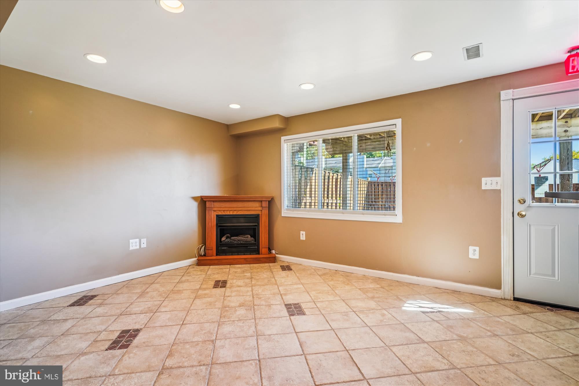 14740 Winding Loop Woodbridge, VA 22191 - Photo 40 of 59 a view of an empty room with a window