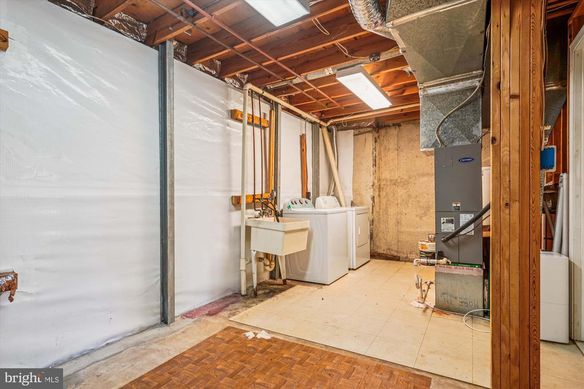 14740 Winding Loop Woodbridge, VA 22191 - Photo 41 of 59 a bathroom with a sink mirror vanity and shower