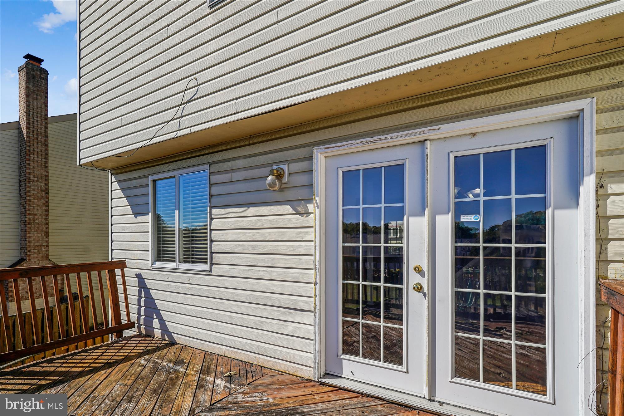 14740 Winding Loop Woodbridge, VA 22191 - Photo 44 of 59 a view of a house with a window
