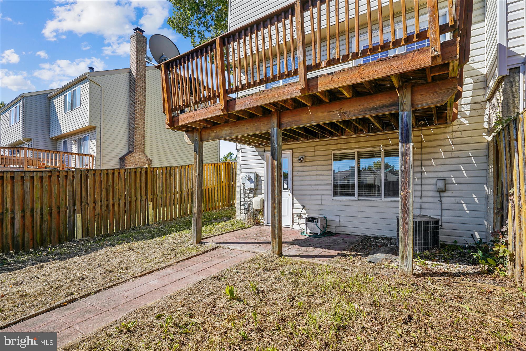14740 Winding Loop Woodbridge, VA 22191 - Photo 45 of 59 a view of a house with a porch