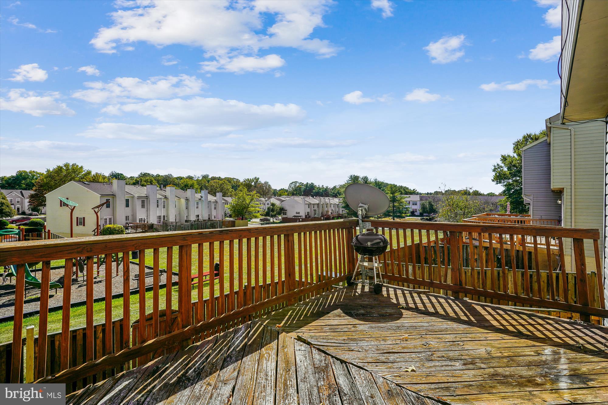 14740 Winding Loop Woodbridge, VA 22191 - Photo 46 of 59 a view of balcony with wooden floor and fence