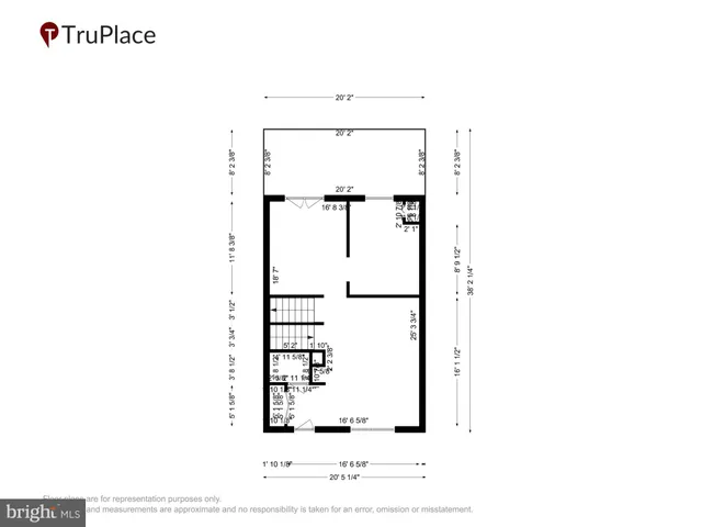 a view of a grey house with large windows