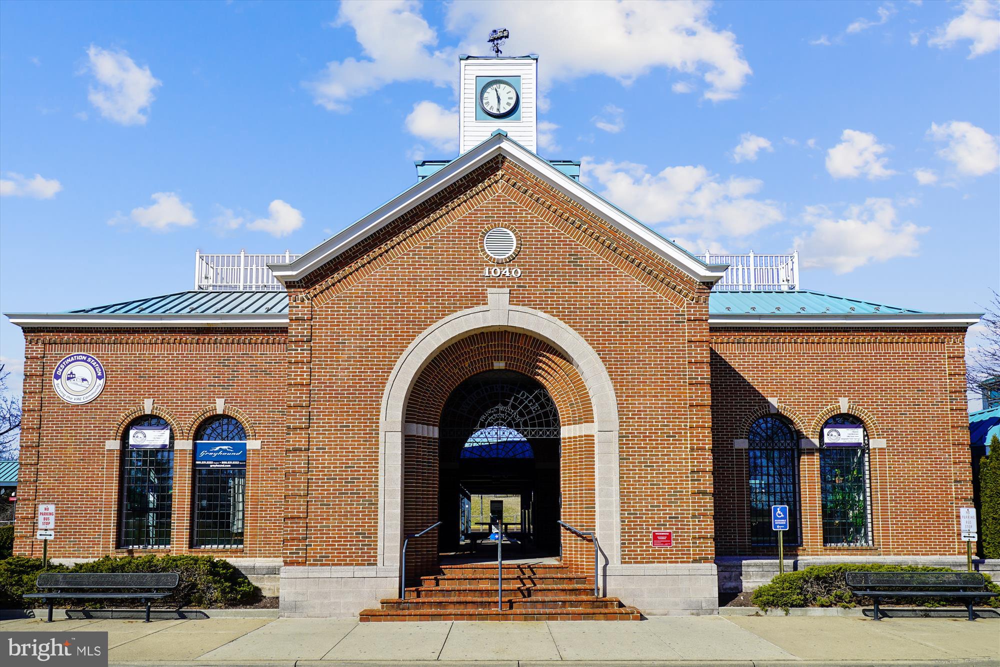 14740 Winding Loop Woodbridge, VA 22191 - Photo 59 of 59 a view of a grey house with large windows