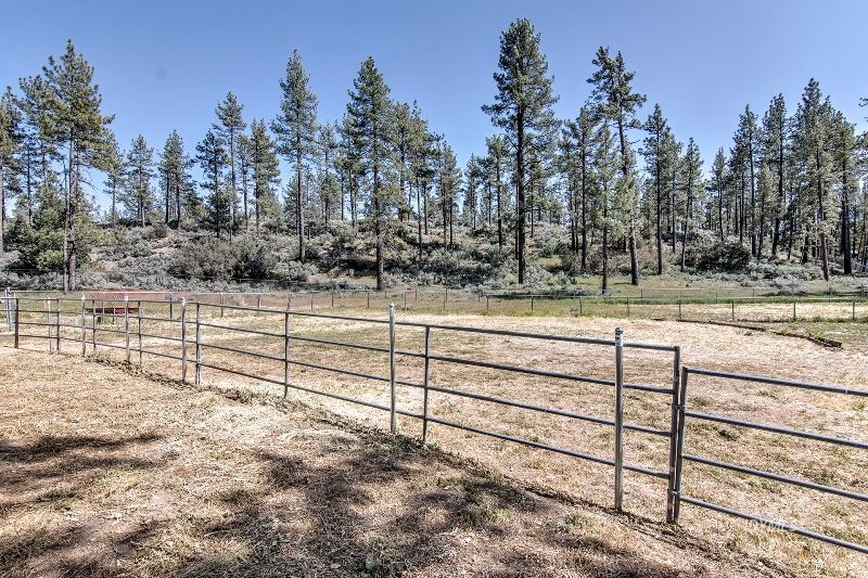 35290 Butterfly Peak Road Mountain Center, CA 92561 - Photo 17 of 68 a view of a yard with wooden fence