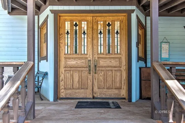 a view of water heater room with wooden ceiling