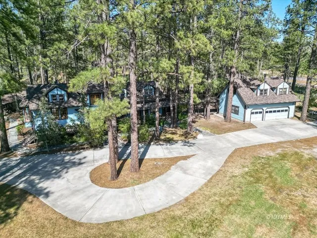 a view of a street with a yard