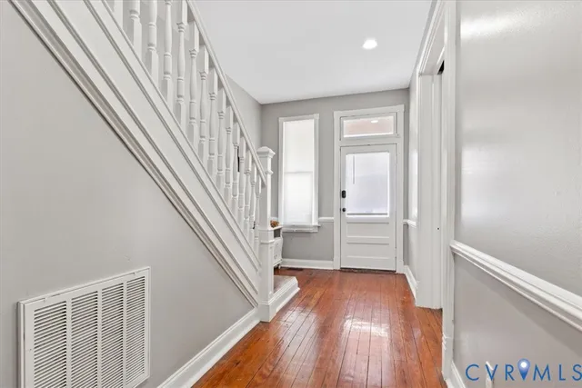 a view of entryway with wooden floor