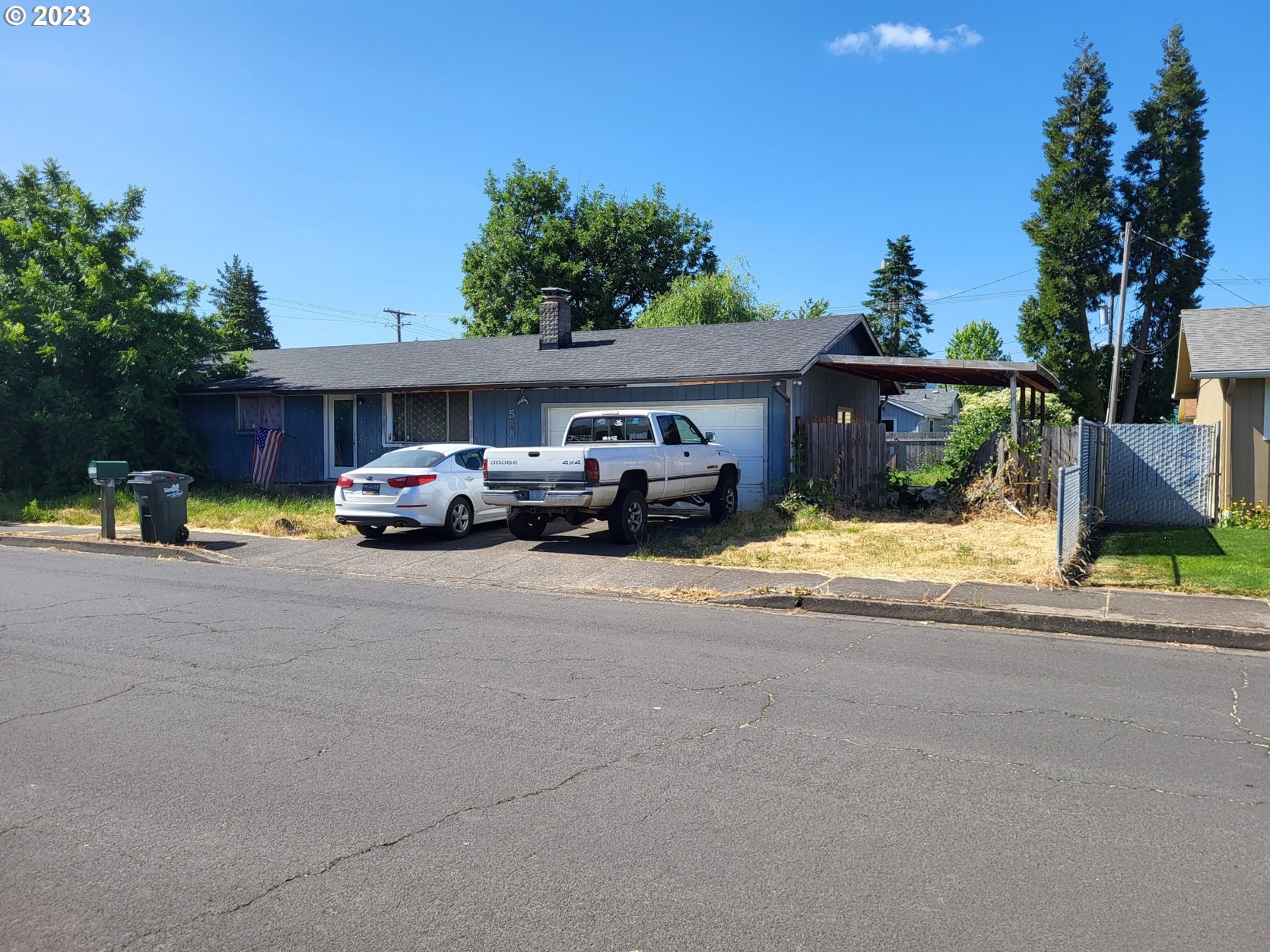 588 37th Street Springfield, OR 97478 - Photo 2 of 18 a car parked in front of a house