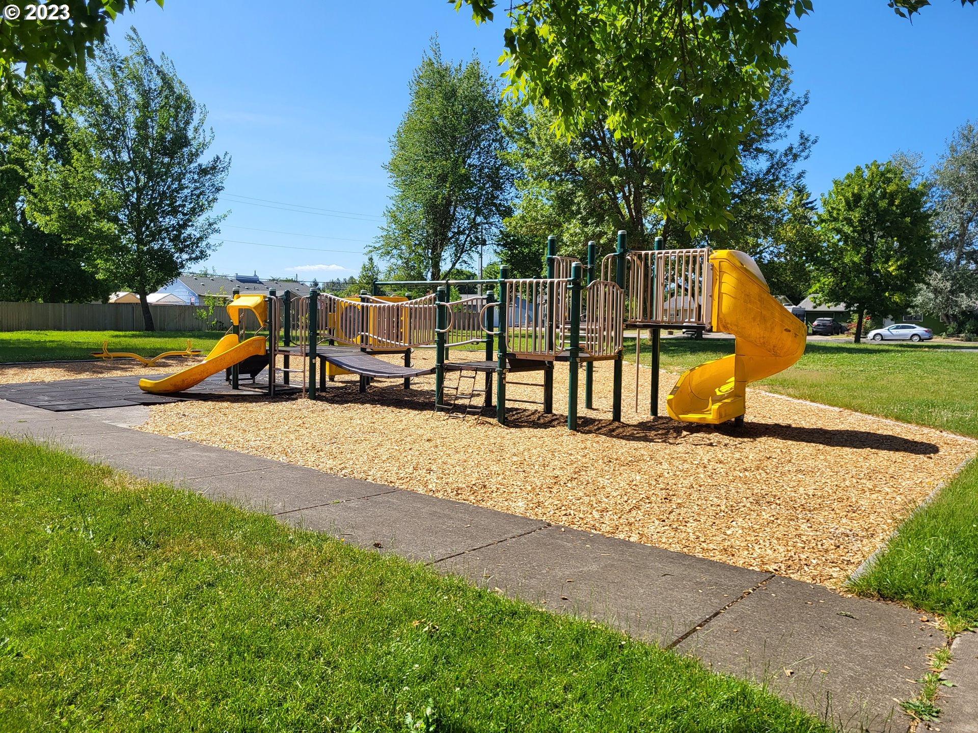 588 37th Street Springfield, OR 97478 - Photo 9 of 18 a view of a park with slide