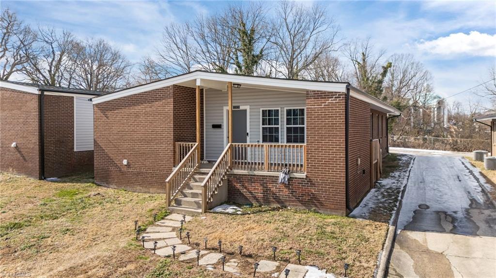 513 Saunders Place, Unit A & B High Point, NC 27260 - Photo 31 of 33 Another angle showing the front porch and driveway to the home.