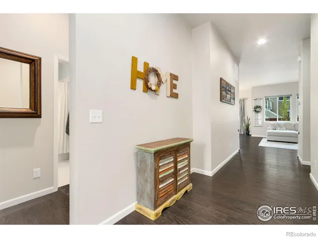 a view of backyard with seating area