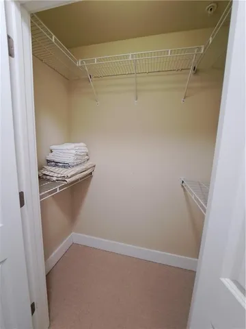 a view of a room with racks on the wall