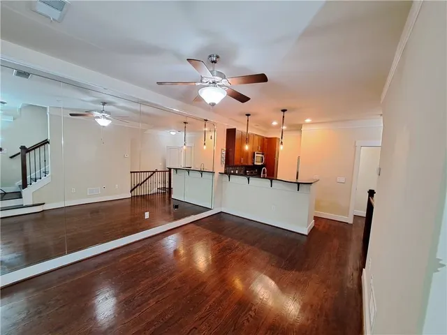 a view of a kitchen with a sink and a dishwasher