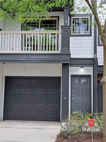 a house view with a garden space