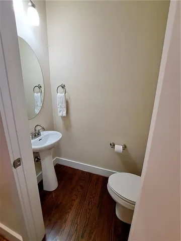 a bathroom with a sink and a toilet