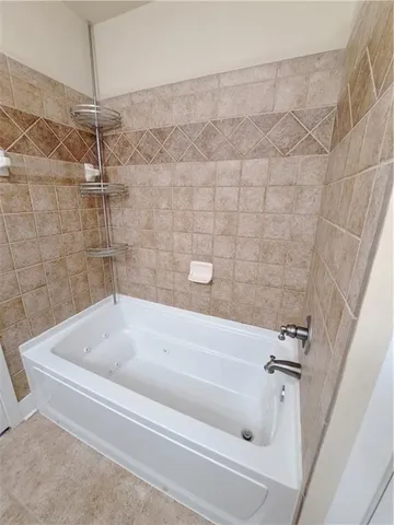 a bathroom with a bathtub