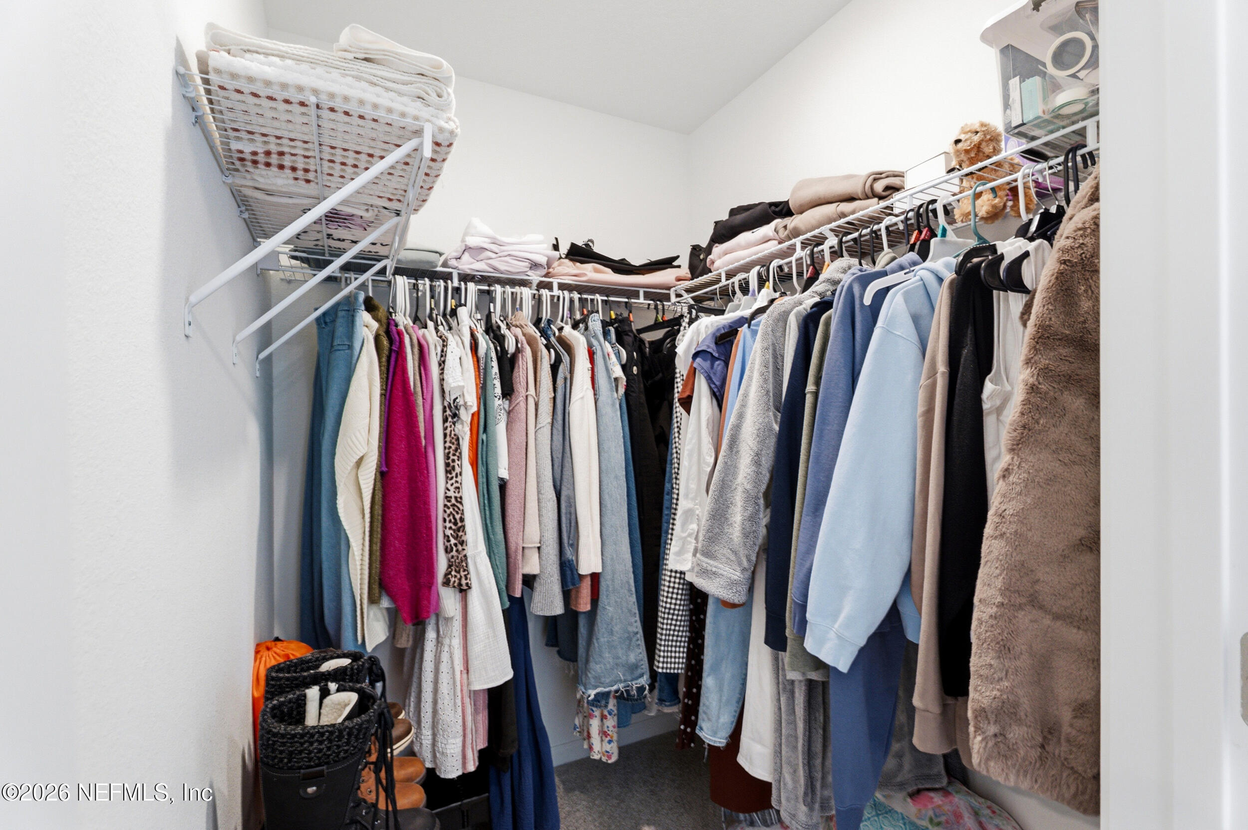 1615 Cluny Road Jacksonville, FL 32218 - Photo 12 of 18 a view of walk in closet with clothes