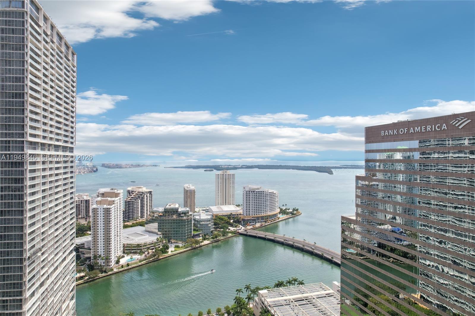 55 Southeast 6th Street, Unit 1608 Miami, FL 33131 - Photo 3 of 24 Stunning high-floor view of the Miami River and Brickell skyline. Ideal location for urban luxury living.