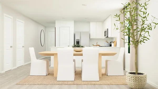 a kitchen with stainless steel appliances kitchen island granite countertop a refrigerator and a stove
