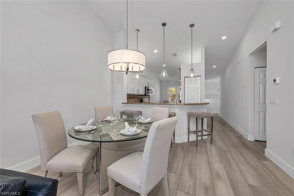 7436 Plumbago Bridge Road, Unit 203 Naples, FL 34109 - Photo 13 of 35 Dining
